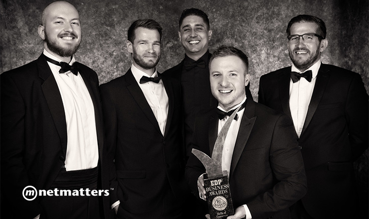 The directors of Netmatters holding the EDP Business Award.