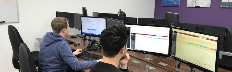 Web developers coding at Netmatters